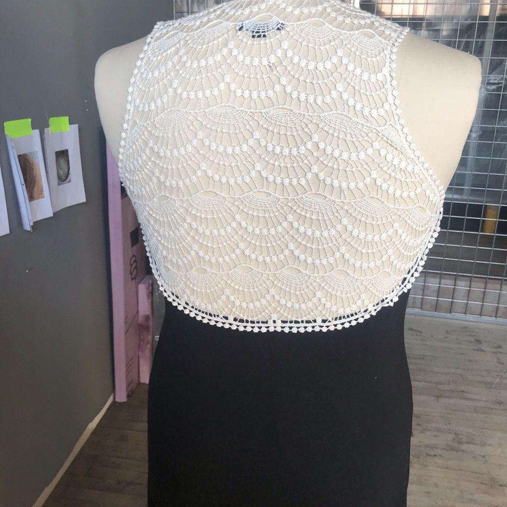 High/low black dress with white crochet detail
